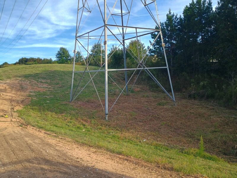 Utility powerline right-of-way cleared of brush and vegetation around transmission tower in South Carolina